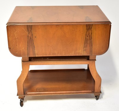 Lot 33 - A vintage tea trolley with under shelf.