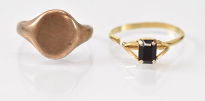 Lot 1492 - A 9ct yellow gold signet ring (cut) and a...