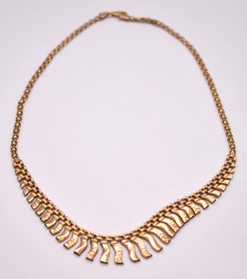 Lot 1182 - A 9ct yellow gold organ pipe chain, length...