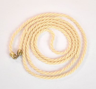 Lot 1186 - An Edwardian opera length multi-string of...