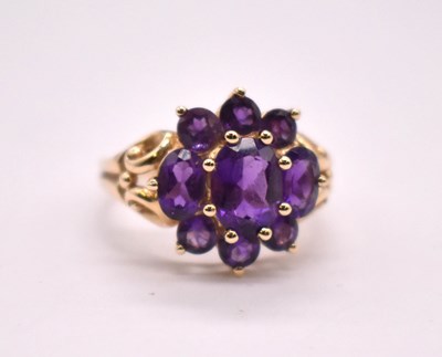 Lot 1180 - A 14ct yellow gold and simulated amethyst...