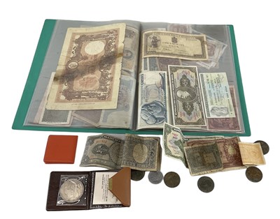 Lot 1629 - An album of all world banknotes including...