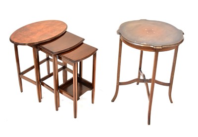 Lot 29 - A Georgian-style mahogany oval topped nest of...