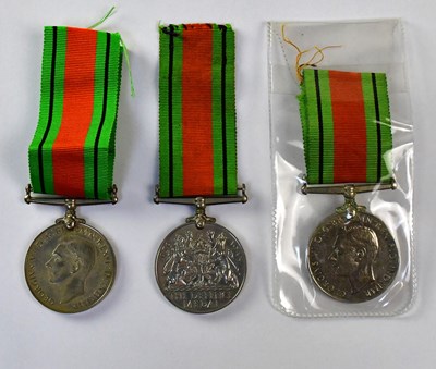 Lot 585 - Three WWII Defence Medals and ribbons (3).