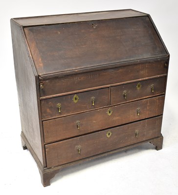 Lot 79 - A George III mahogany bureau with fall front...