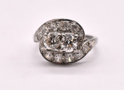Lot 1134 - A late 1920s platinum Art Deco diamond set...