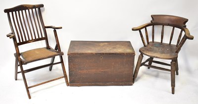 Lot 53 - An Edwardian folding rail back chair with...