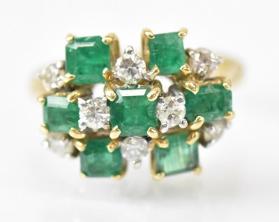 Lot 1432 - An 18ct yellow gold diamond and emerald...
