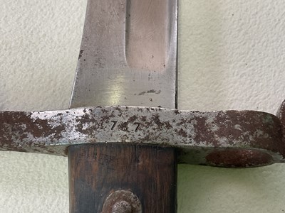 Lot 18 - A British Victorian bayonet with scabbard,...