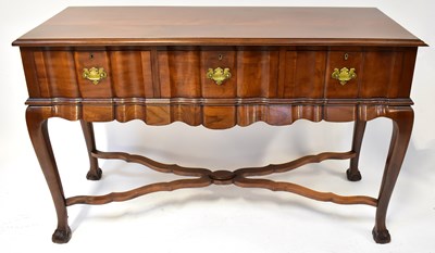 Lot 30 - A Georgian-style side table with three carved...