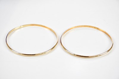 Lot 283 - Two 9ct yellow gold bangles, combined 18.44g.
