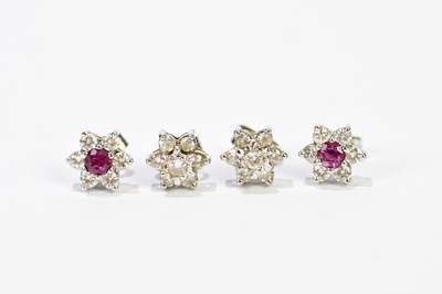 Lot 462 - A pair of 18ct white gold diamond floral ear...