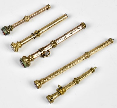 Lot 1347 - Five Victorian yellow metal propelling pencils,...