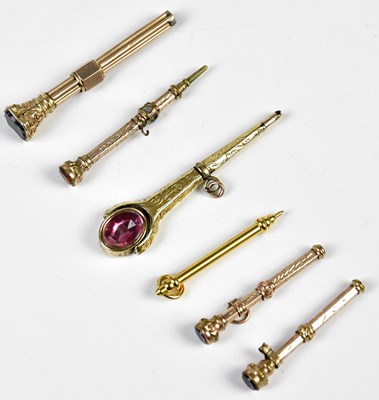 Lot 1331 - Six late Victorian yellow metal propelling...
