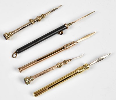 Lot 1348 - Four late 19th/early 20th century yellow metal...
