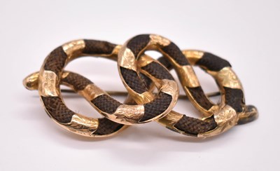 Lot 1230 - A large Victorian yellow metal mourning brooch...