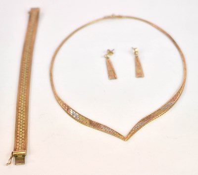 Lot 1228 - A suite of 9ct three tone jewellery comprising...