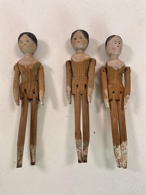 Lot 386 - Three Grodnertal style wooden peg dolls, all...