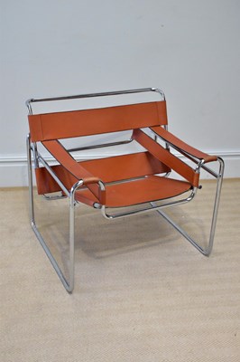 Lot 2053 - AFTER MARCEL BREUER; a tan leather and chrome...