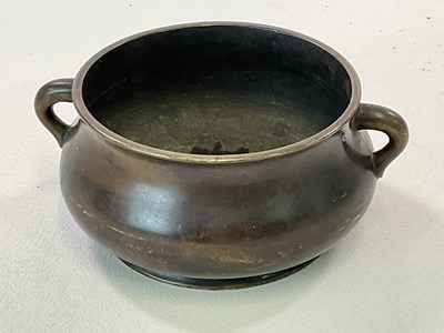 Lot 498 - A late 19th century Chinese bronze censer with...