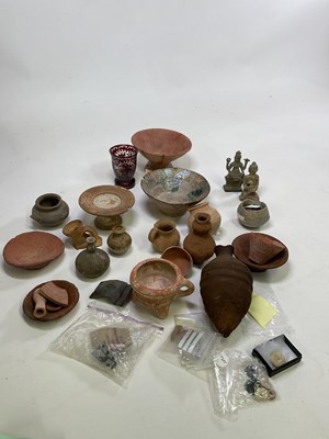 Lot 517 - A collection of ancient pottery and artefacts,...