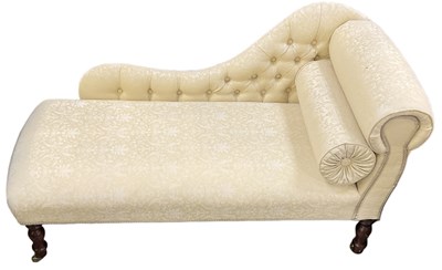 Lot 33 - A reproduction mahogany cream upholstered...