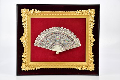 Lot 1296 - A Victorian hand painted bone fan, with...