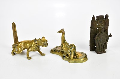 Lot 1416 - A 19th century match striker modelled as a...