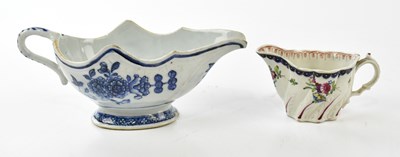 Lot 2781 - A late 18th century blue and white sauce boat...