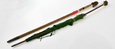 Lot 1293 - An early 20th century parasol with carved...