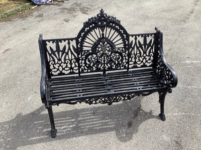 Lot 1220 - A Victorian style black painted cast iron...