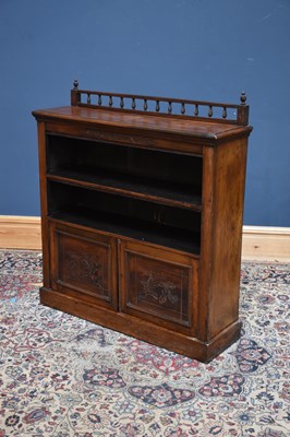Lot 1044 - A late Victorian walnut bookcase with two base...