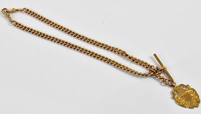 Lot 323 - A 9ct gold double Albert chain, suspending a...