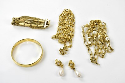 Lot 936 - CHRISTIAN DIOR; a gold tone long link chain...