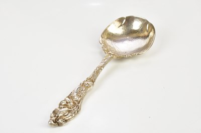 Lot 2069 - An American sterling silver serving spoon in...