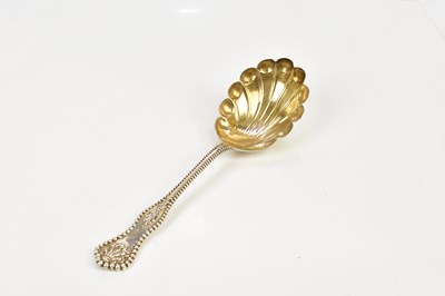 Lot 2070 - W H GLENNY SONS & CO; a sterling silver spoon...