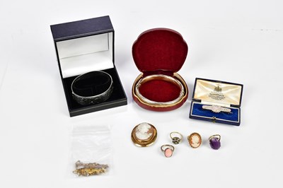 Lot 574 - A 15ct yellow gold ruby and diamond set bar...