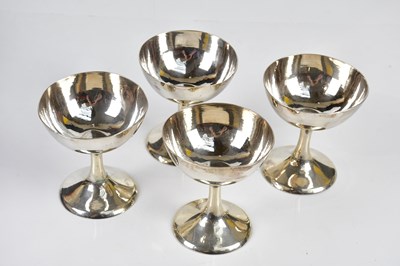 Lot 2068 - Four Syrian white metal goblets, height 9.5cm,...