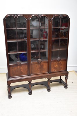 Lot 89 - An early 20th century mahogany three door...