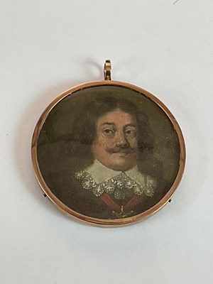 Lot 1502 - A circular portrait miniature, possibly 17th...