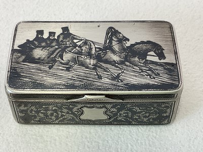 Lot 1032 - A Russian silver niello snuff box of rounded...