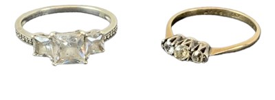 Lot 1490 - A 9ct white gold cubic zirconia three stone...
