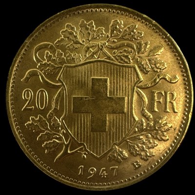 Lot 1582 - A Swiss 1947 twenty francs gold coin.