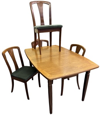 Lot 38 - MEREDEW; a mid century teak extending dining...