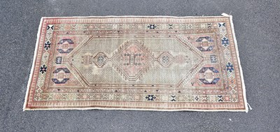 Lot 1490 - A hand woven wool Caucasian rug with all over...