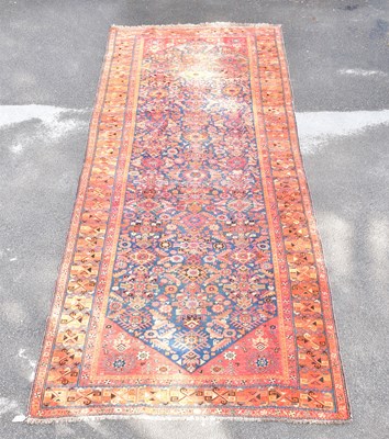 Lot 1467 - A Caucasian hand woven wool runner, with...