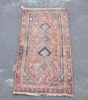 Lot 1488 - A Caucasian hand woven wool hanging rug, with...