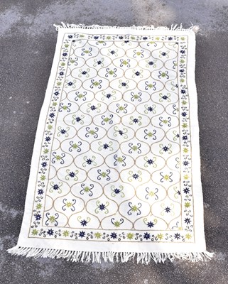 Lot 1491 - A hand woven wool rug with hand woven all over...