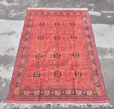 Lot 1466 - A Caucasian hand woven wool rug, with...