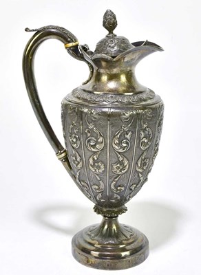 Lot 2037 - A Georgian hallmarked silver wine ewer, with...